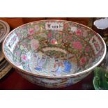 A modern Chinese porcelain punch bowl decorated in the famille rose style