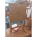 A 57cm 20th Century stained wood tilt-top tea table with stencilled decoration a V-shaped gated