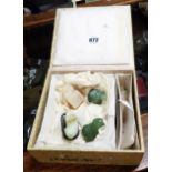 A 20th Century Chinese presentation box containing a small quantity of carved hardstone animal