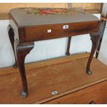 An old polished oak dressing stool with upholstered drop-in seat, set on cabriole legs with pad
