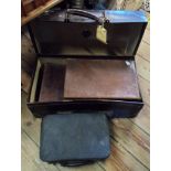 Four vintage fibreboard and leather suitcases - various condition