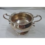 A small silver sugar bowl with flanking cast acanthus scroll handles - Chester, 1917