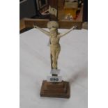 A rosewood crucifix with carved ivory Christ figure