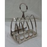 A small silver mitre shaped toast rack