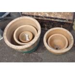 A set of five ceramic garden pots