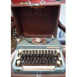 A vintage Imperial Good Companion portable typewriter in original leatherette covered hard case
