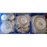 Three plastic crates containing a large quantity of Chinese rice pattern dinner and teaware