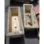 A pair of concrete garden planters of trough form with all over classical knot frieze decoration