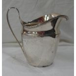 A silver milk jug with cast reeded rim - Birmingham, 1911