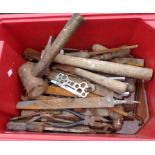A crate containing assorted tools