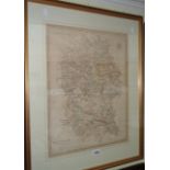 A framed antique map print of Wiltshire with hand painted line borders
