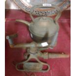 A vintage cast iron Rain King garden sprinkler - sold with an old copper kettle