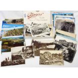 A small collection of 20th Century postcards including European souvenir topographic and later