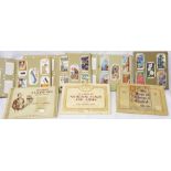 Three Wills's cigarette card albums with corner mounted contents and another part similar - sold