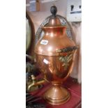 An old copper samovar with brass spigot tap and turned ebonised wood handles