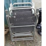 Four metal folding chairs with grey painted finish
