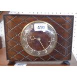 A retro stained wood cased desk timepiece