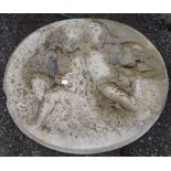 A cast concrete oval plaque and three pedestal stands