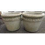 Two large cast concrete garden plant pots