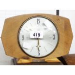 A vintage wooden cased Smiths desk timepiece with silvered dial and eight day floating balance