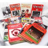A collection of Manchester United programmes and other publications including There's Only One