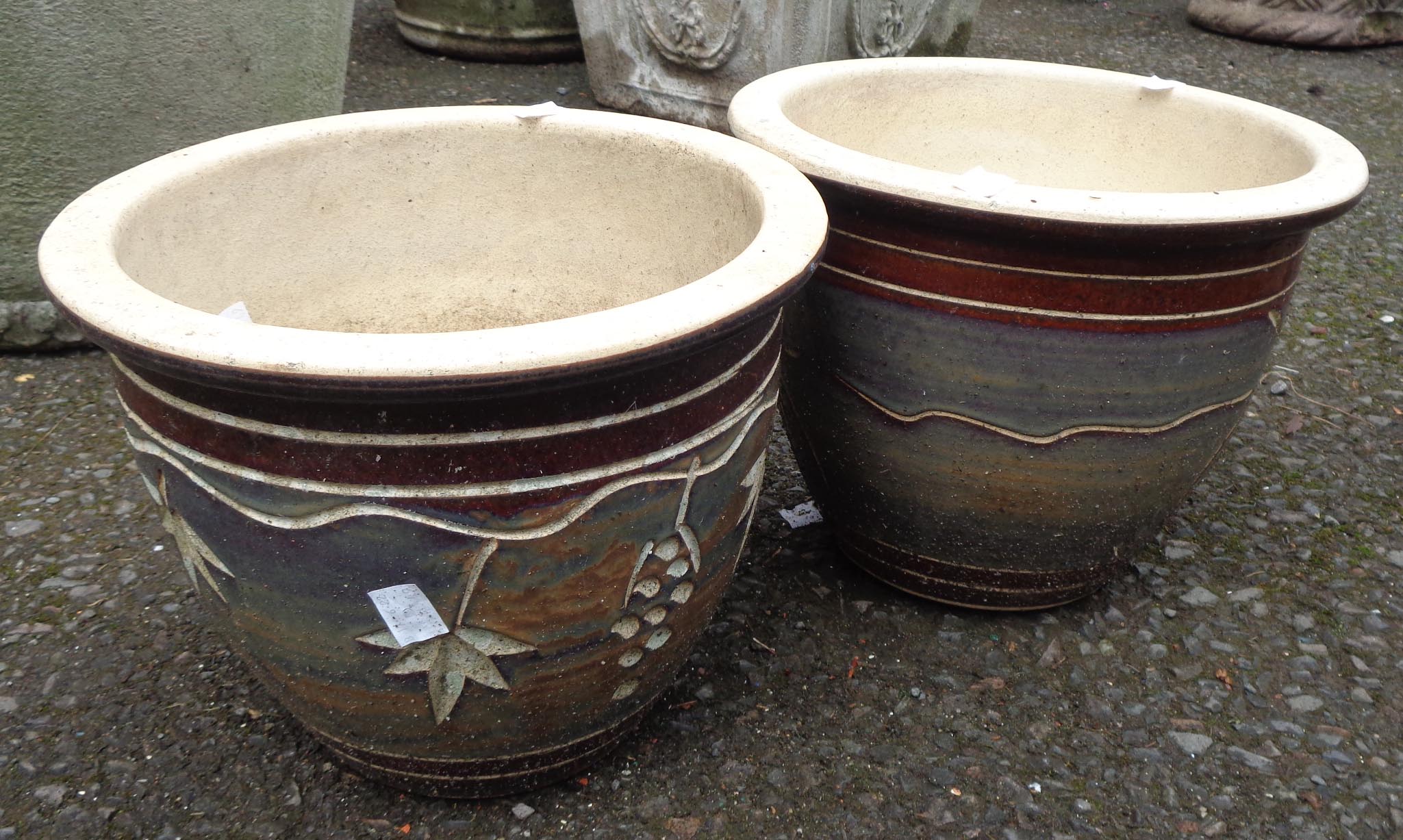 Two decorative plant pots