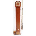 A vintage walnut cased grandmother clock with Smiths eight day chiming movement