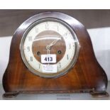 A vintage Smiths Enfield stained walnut cased mantel clock with eight day gong striking movement