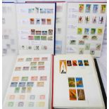 Three stock books containing an extensive collection of Papua New Guinea stamps including 1920's and