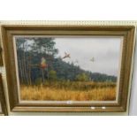Campbell Black: a gilt framed oil on canvas, depicting flushed pheasants flying from woodland -