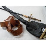 A vintage Toledo (Spain) dress sword with decorative chased blade with scabbard and outer canvas