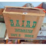 A vintage Baird Tapemaster reel-to-reel tape recorder with original instruction booklet and box