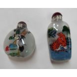 Two Chinese reverse painted snuff bottles