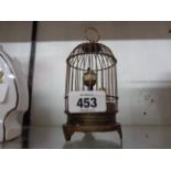 A small reproduction birdcage automaton style timepiece with mechanical movement