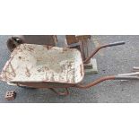 An old metal wheel barrow