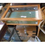 A 64cm reproduction mahogany and herring-bone strung table vitrine with glazed lift-top and glazed