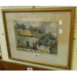 A gilt framed watercolour, depicting farm buildings