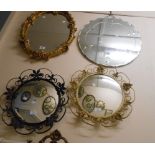 Three vintage wall mirrors, comprising a frameless circular mirror with cut decoration and two