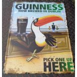 A modern printed tin Guinness Toucan advertising sign