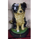 A modern painted cast iron doorstop in the form of a collie dog