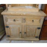 A 1.07m modern pine dresser base with two short drawers over a pair of panelled cupboard doors