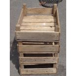 Four vintage slatted wood apple crates