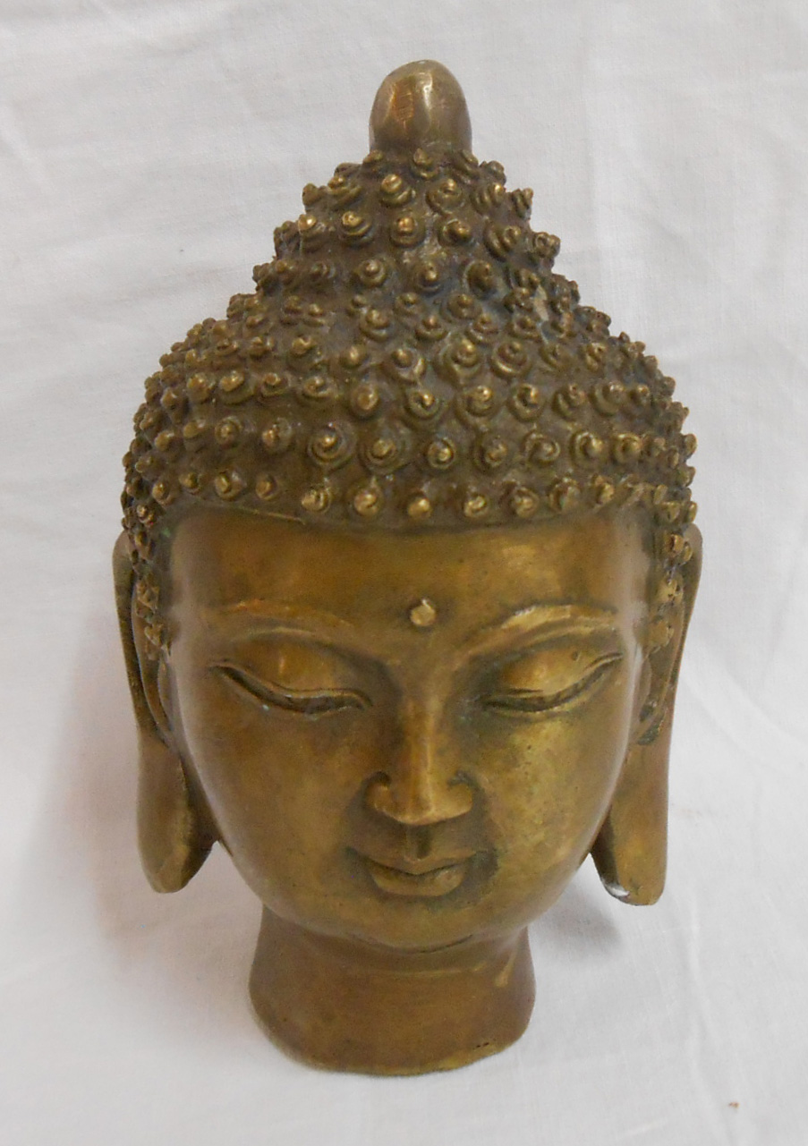 A modern cast brass Eastern buddha head