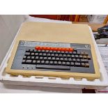 A vintage BBC Micro computer system in original polystyrene packaging - sold with accessories