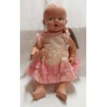A vintage Pedigree composition doll
