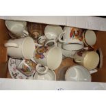 A box containing a quantity of Royal Commemorative ceramic mugs, etc.