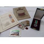 A box containing two Player's Cigarette card albums comprising The Coronation of H.M. King George VI