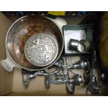 A small quantity of silver plated items including three figural candlesticks, teaspoons, circular