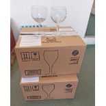 A quantity of twenty four boxed commercial wine glasses