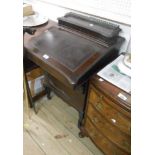 A 56cm late Victorian stained mixed wood Davenport with lift-top stationery compartment to top,